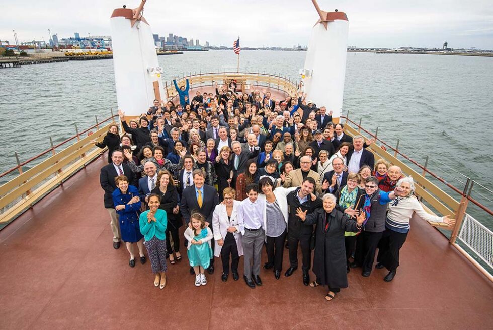 group outing on a boat in Boston Harbor