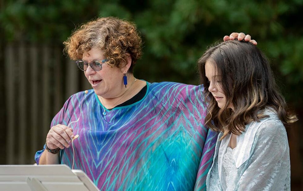 girl with her rabbi at bat mitzvah