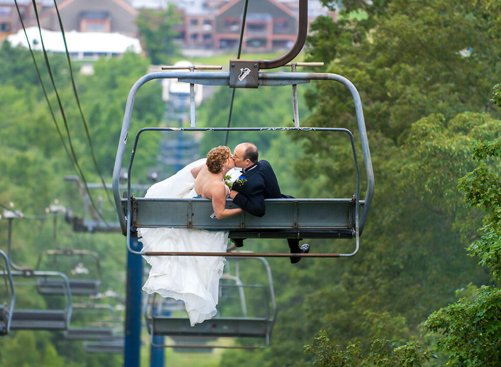 couple kissing in a ski lift