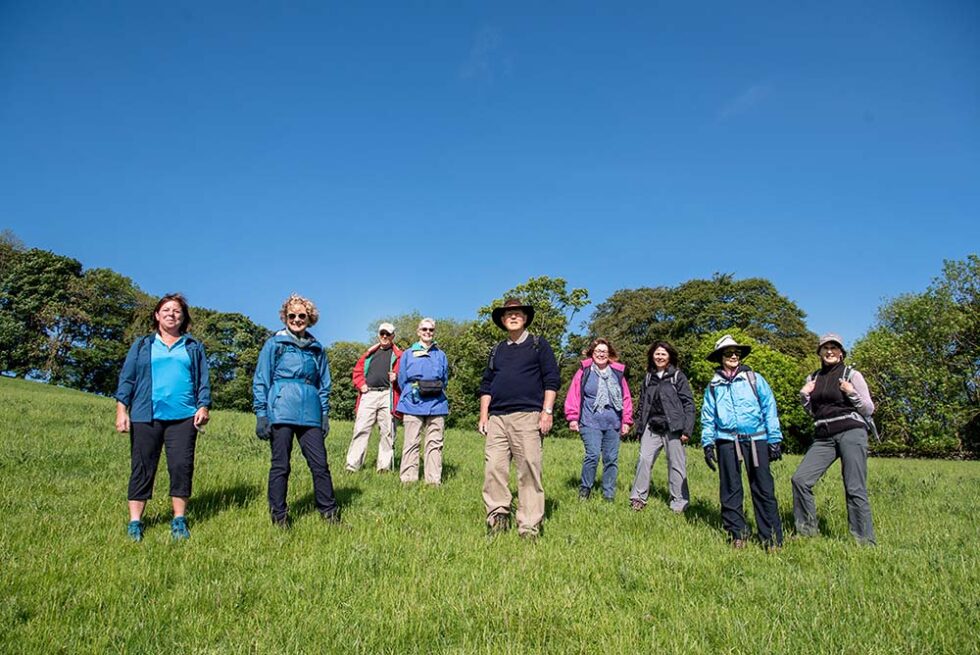 group of hikers in a meadow