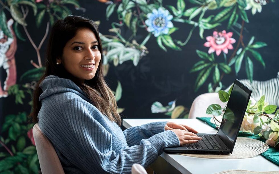 young woman working on her computer